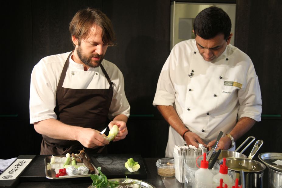 Back in the kitchen, Redzip shows Kapoor how to prepare a simple dish in the Noma style, using only local ingredients. 
