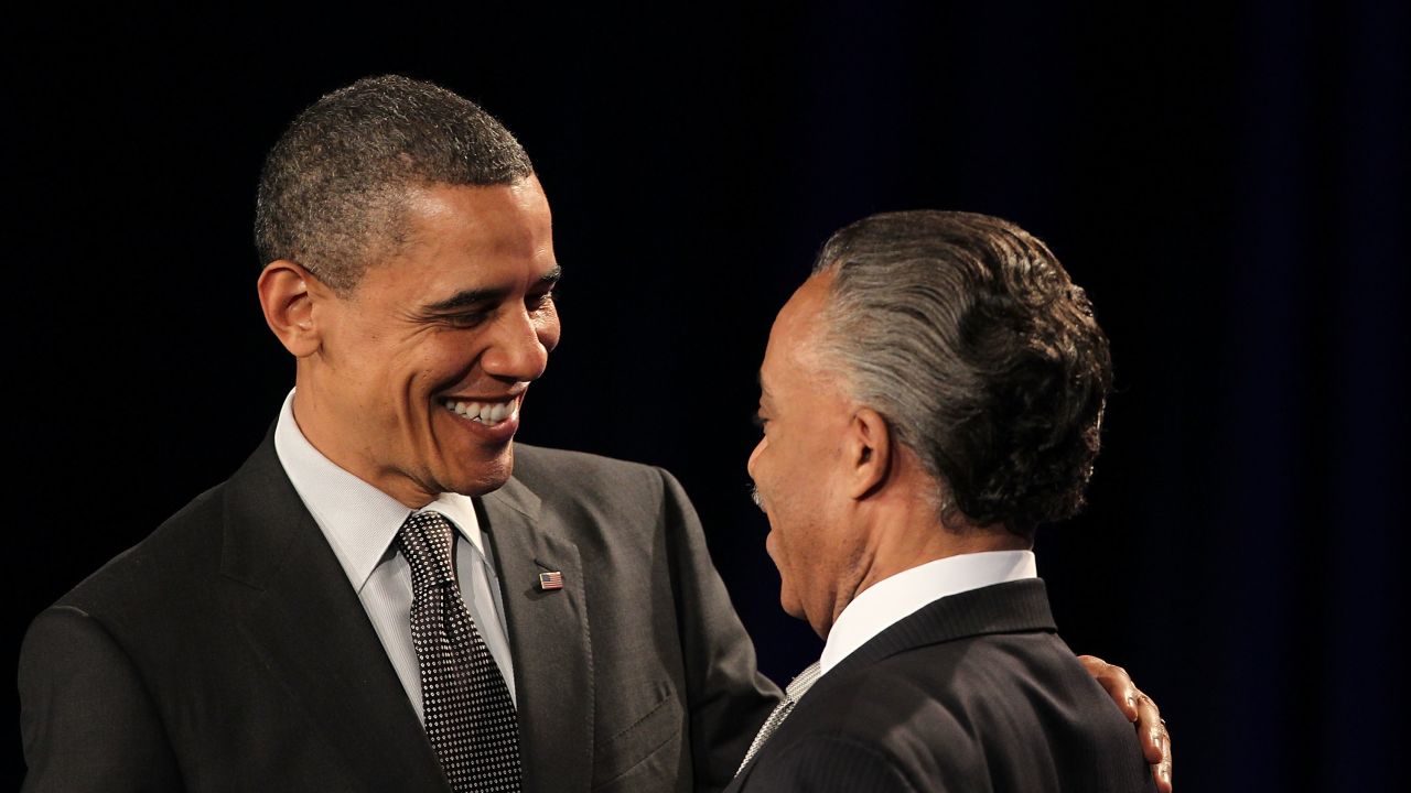 President Barack Obama greets Sharpton at a National Action Network anniversary function last year.