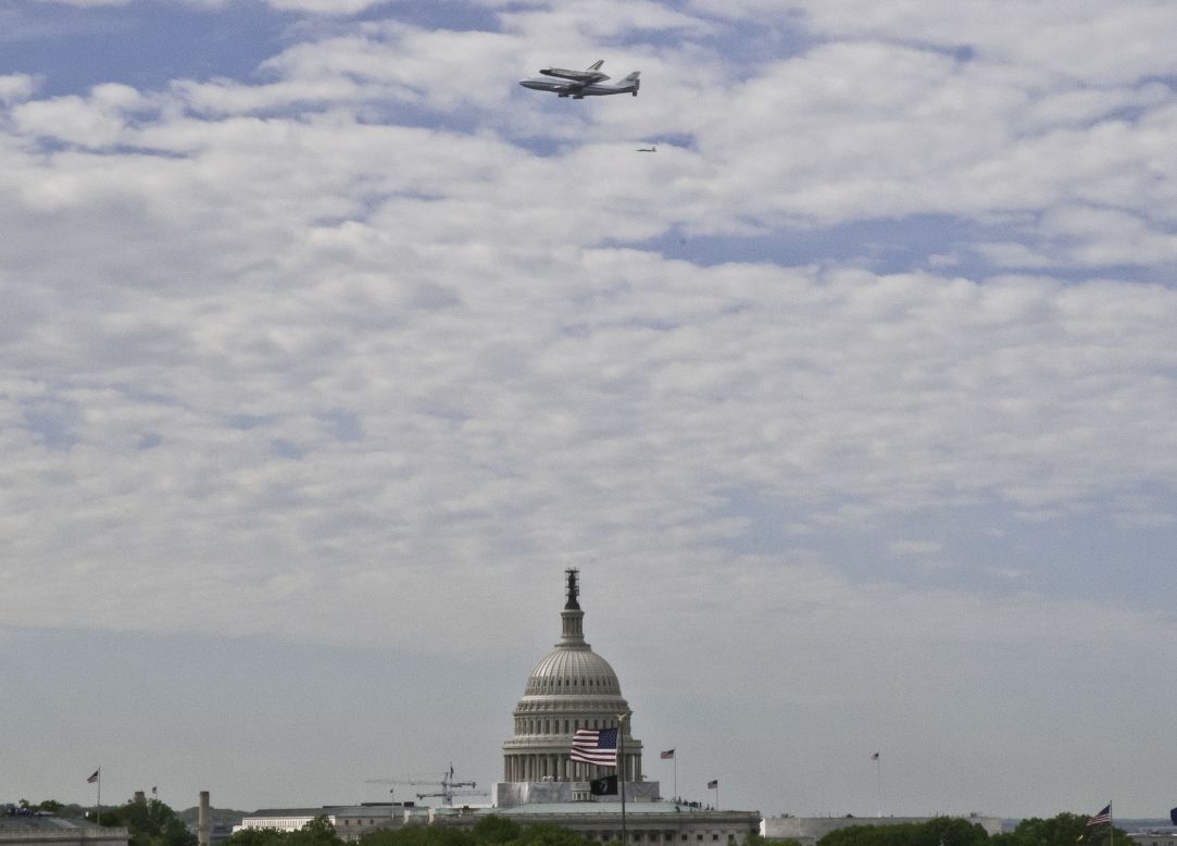Discovery makes a low pass over the Washington, D.C., area before its final landing Tuesday.