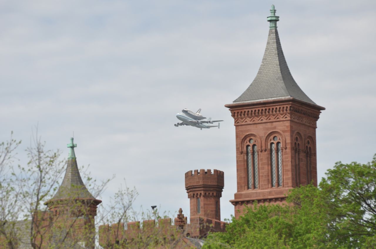 The shuttle will officially become part of the Smithsonian's collection at a ceremony on April 19 at the air and space museum's Udvar-Hazy Center in Chantilly, Virginia. Here, the shuttle flies past the Smithsonian castle on the National Mall.