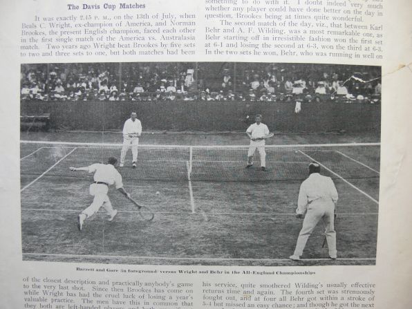 Behr and American partner Beals Wright (far end) playing in the doubles championship at the All England Club at Wimbledon. 