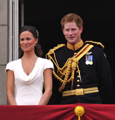 Middleton appears with best man Prince Harry on the balcony at Buckingham Palace after the royal wedding on April 29, 2011.