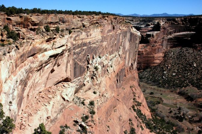 Visitors to Canyon De Chelly in Arizona can get a view of Massacre Cave at the Massacre Cave Overlook on the north rim drive of the park.
