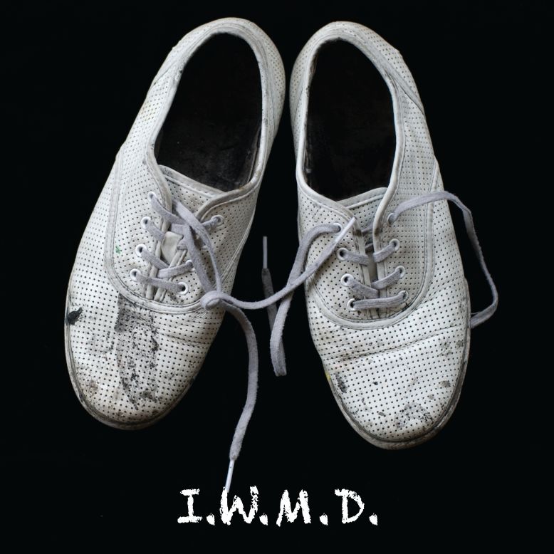 Hanaa Malallah's 2011 artwork "I.W.M.D" shows a picture of her own shoes, labeled as 'Iraq's Weapons of Mass Destruction.' 
