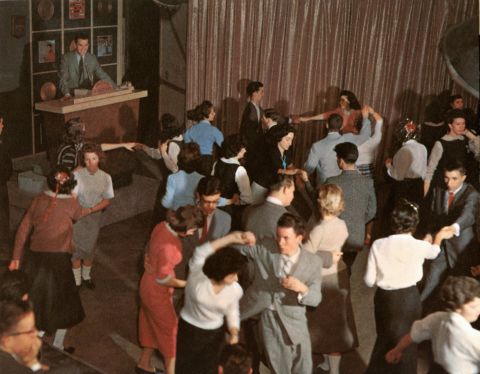 Clark presides over 'American Bandstand' as teenagers dance to top 40 popular music in Philadelphia, Pennsylvania, circa 1957.