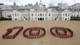 More than 250 Guardsmen mark 100 days until the London 2012 Olympics starts on on July 27.  They are at Horse Guards Parade in central London, which will host beach volleyball.