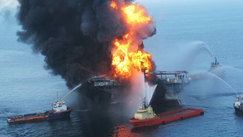 The Deepwater Horizon oil rig burns out of control before sinking into the Gulf of Mexico in April 2010.