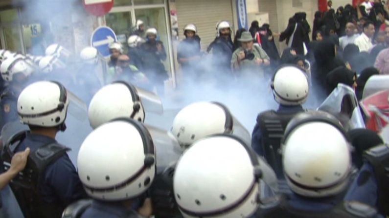 CNN's Fred Pleitgen went to Bahrain to report on the situation, and accompanied riot police as they confronted protesters in the streets.