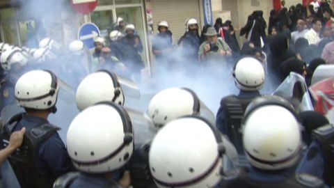 CNN's Fred Pleitgen went to Bahrain to report on the situation, and accompanied riot police as they confronted protesters in the streets.