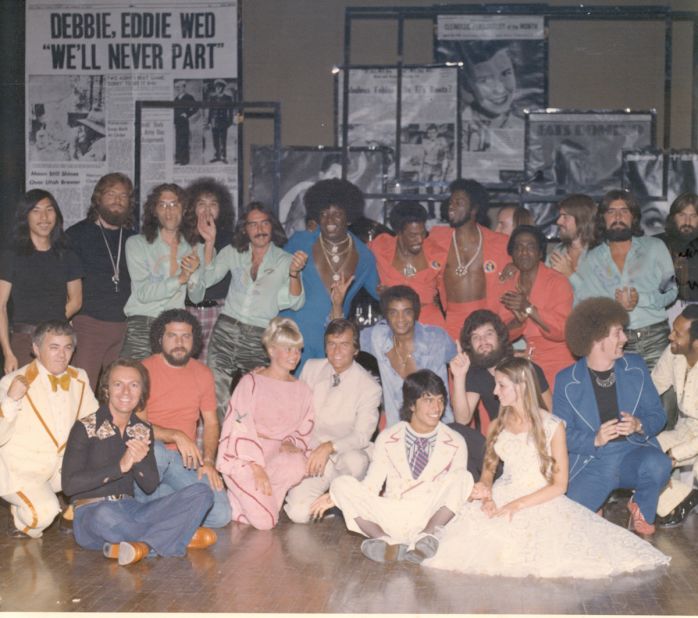 Drummer Bill Rodriguez was among those who posed for this large group photo with Clark for his Las Vegas show in the 1970s. Rodriguez admitted to a mistake in one of the performances: "I was so nervous I launched into the 'Bandstand' theme all by myself before Dick's monologue, leaving Dick alone on the stage with a mic while I played by myself before realizing I'd just massively blown it. Dick just told the audience, 'Ah, the enthusiasm of youth,' and made it seem as if it was part of the show. " 