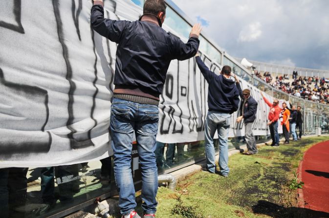 Livorno fans display a banner at Armando Picchi Stadium on Wednesday as part of a ceremony commemorating the 25-year-old player.