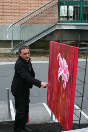 The first artwork to go up in flames was a painting by French artist Severine Bourguignon.