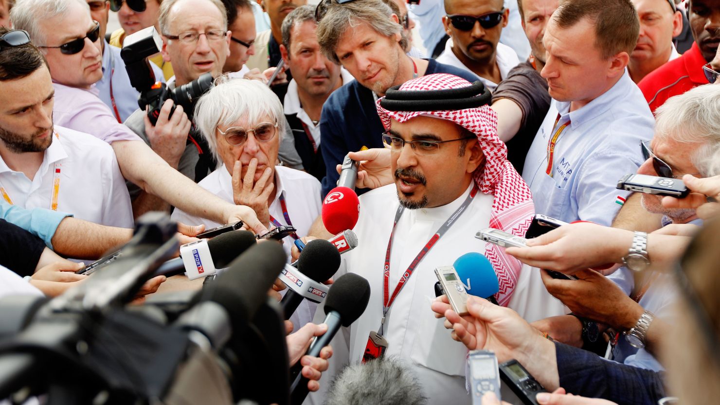 Bahrain's Crown Prince Salman bin Hamad Al Khalifa (R) and F1 chief Bernie Ecclestone face the press Friday