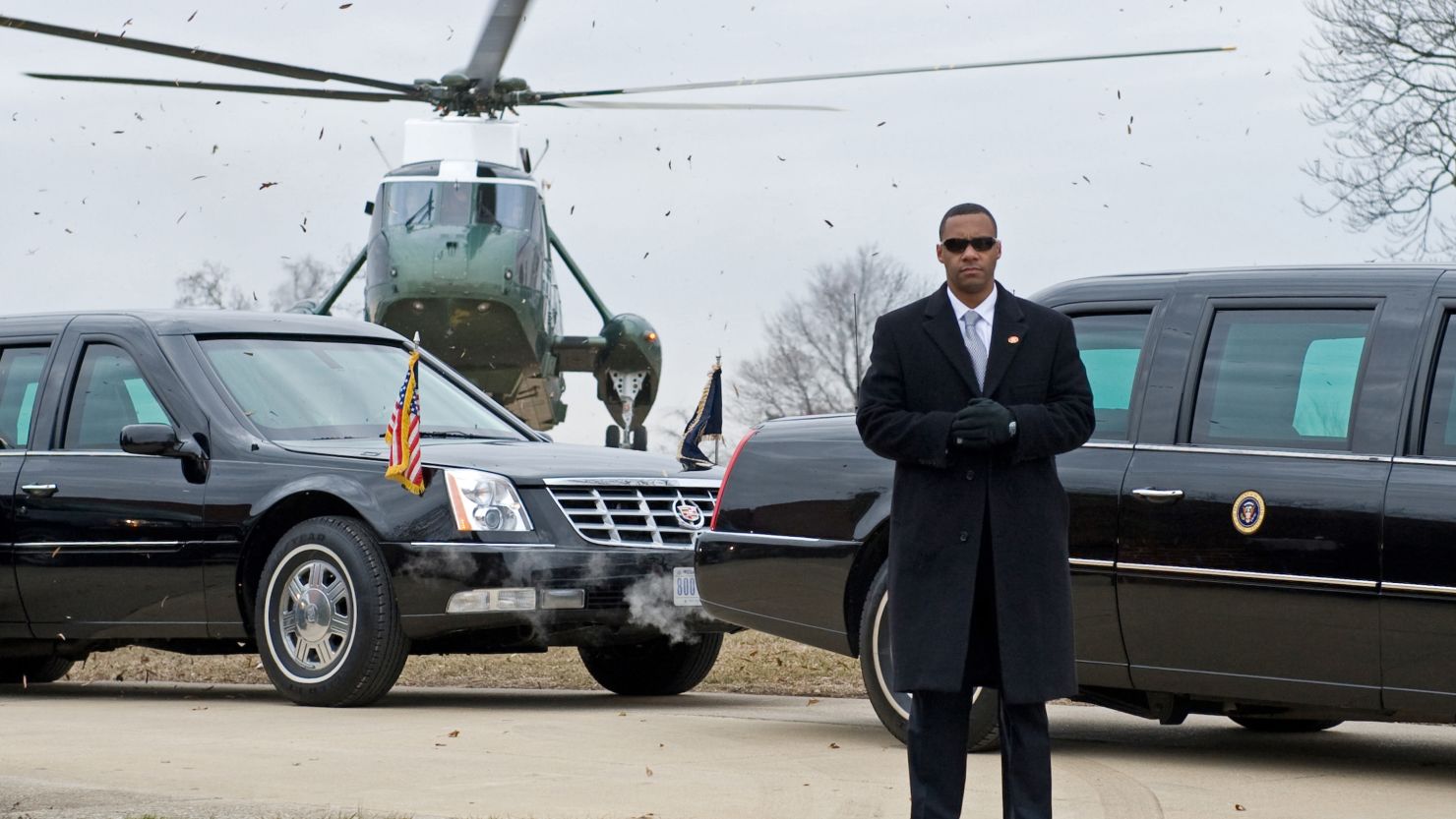  US Secret Service agent stands by President Obama's limousine at Fort McHenry in Baltimore in 2010.