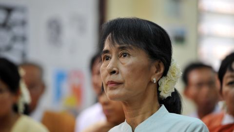 Aung San Suu Kyi's party has dropped an effort to change wording of an oath that lawmakers have to take.