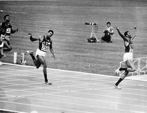 Smith won the 200 meters but Carlos (center) was beaten by Norman (far left) on the line. Norman's time of 20 seconds flat would have won gold at the 2000 Sydney Olympics.