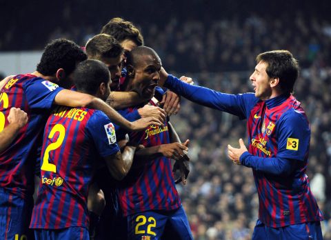Eric Abidal is congratulated after scoring in Barcelona's 2-1 Copa Del Rey win over Real Madrid in January. It was only his second goal for the Catalans. The France international has since had a liver transplant.
