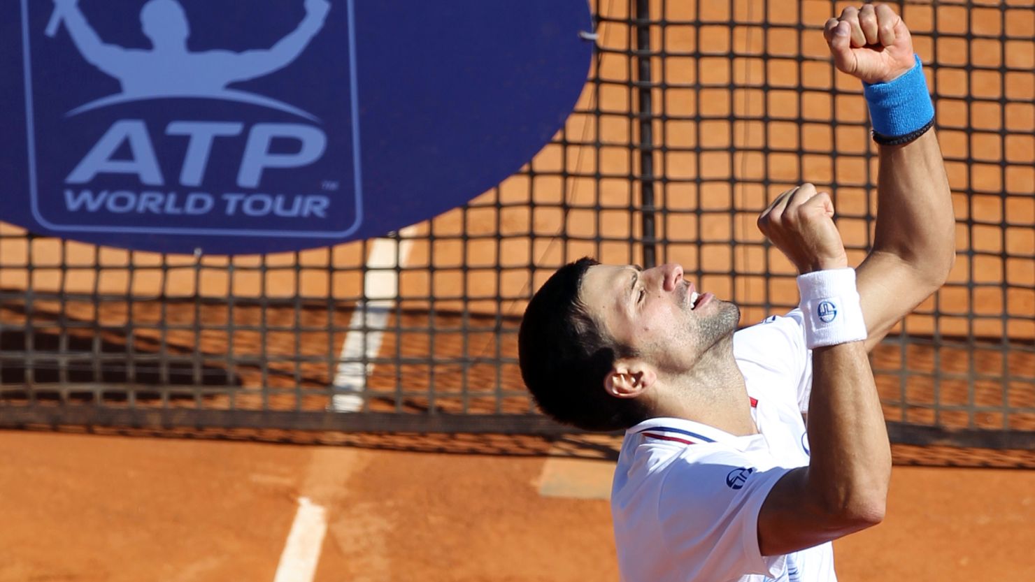 Serbian tennis star Novak Djokovic looks to the sky after beating world No. 7 Tomas Berdych on Saturday. 