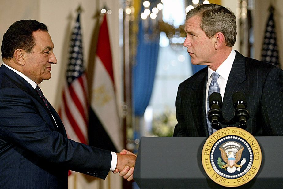 US President George W. Bush greets Mubarak at the White House in 2002 to talk about the Middle East crisis and the war in Afghanistan.
