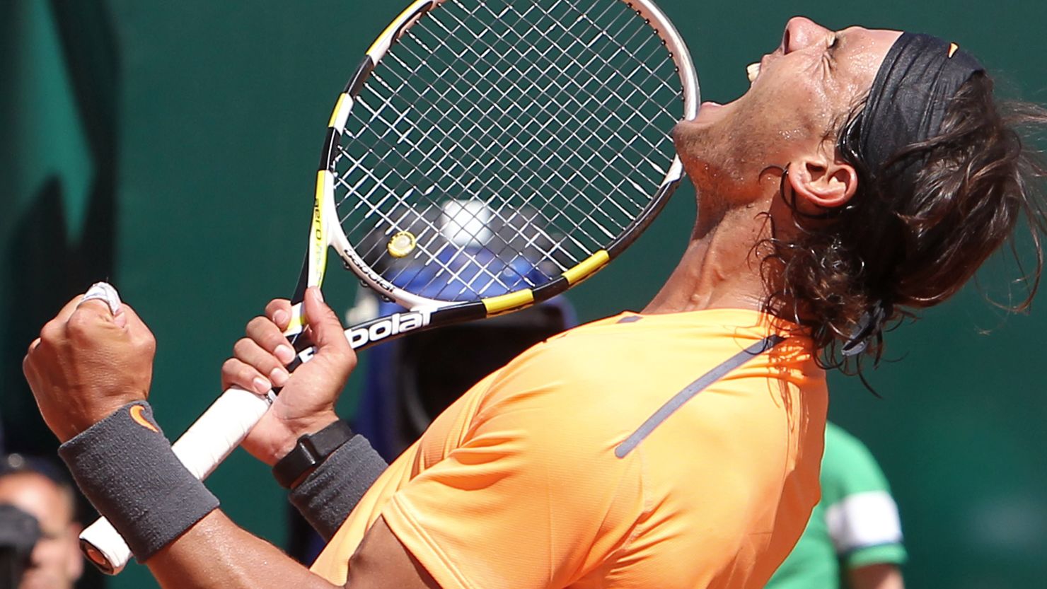 Rafael Nadal celebrates in typical style after beating Novak Djokovic in the Monte Carlo final.