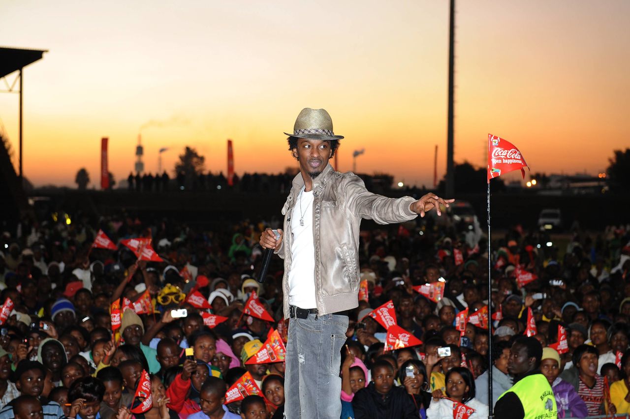 K'naan performs "Wavin' Flag" on June 01, 2010, in Witbank, South Africa. The song was selected as the official anthem of the 2010 FIFA World Cup.