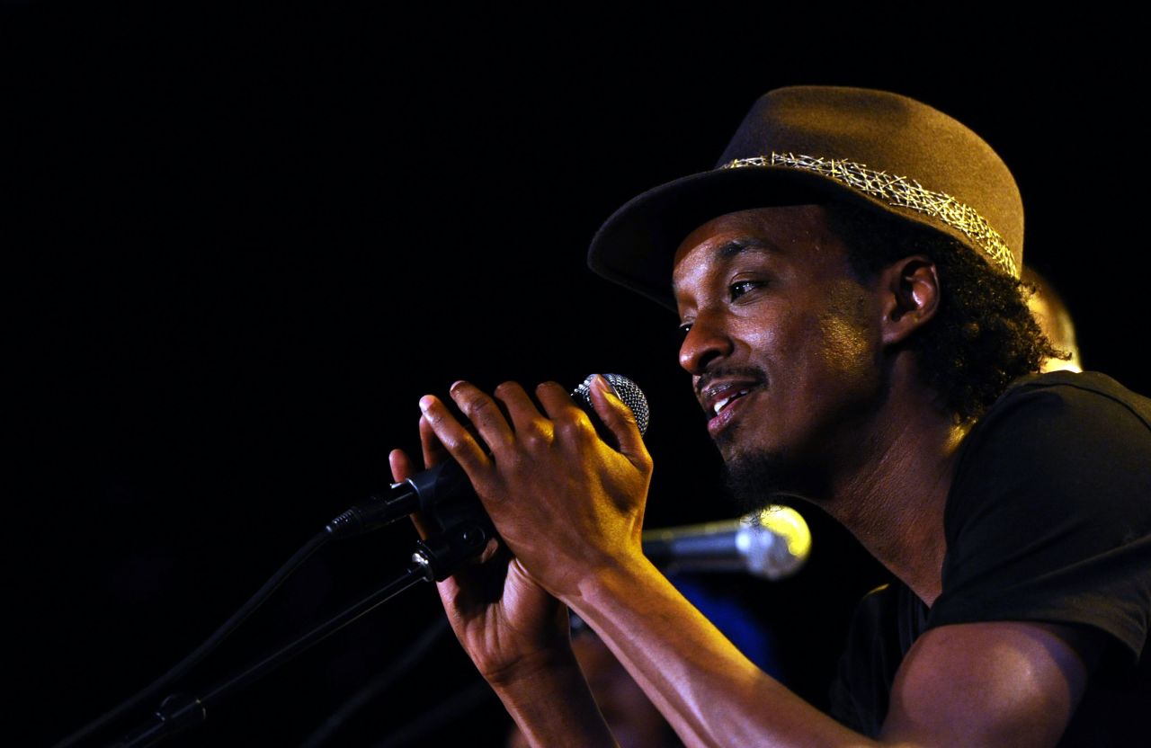 K'naan is a superstar from Somalia and a global hip-hop sensation. Critics have compared him to both Bob Marley and Eminem.