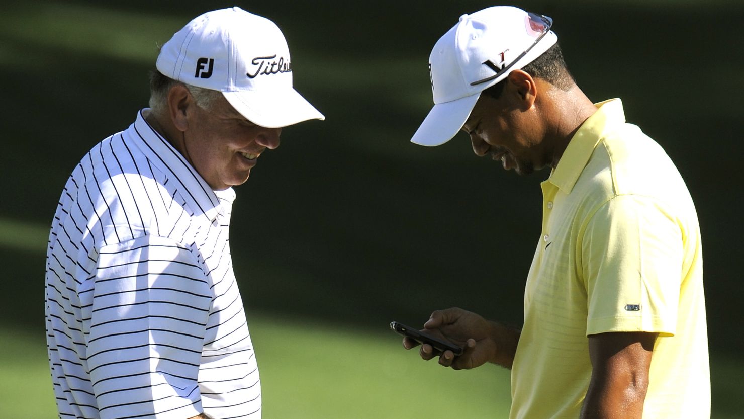 Golfers Mark O'Meara and Tiger Woods aren't the only ones who'll be able to check their phones on the course.