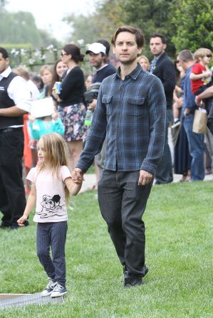 Tobey Maguire attends a charity event with his family in the Pacific Palisades.