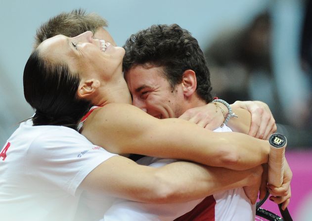 World No. 17 Jelena Jankovic, left, celebrates with her teammates after beating Russia's Svetlana Kuznetsova to put Serbia in to the Fed Cup final for the first time. 