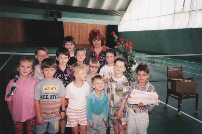 Azarenka (far left) first became involved in the sport when her mother started working in a tennis center in her native Belarus. Her first coach was Valentina Rzhanih (also pictured).