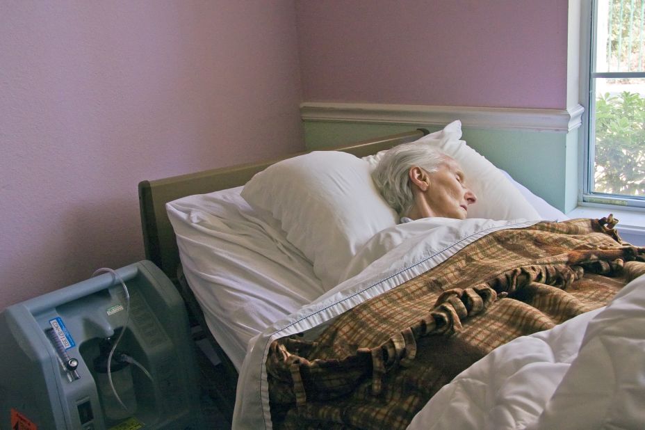 Cathy Greenblat's images of people around the world living with Alzheimer's disease include this unidentified patient with Alzheimer's in Texas who was near the end of her life. 