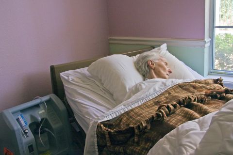 Cathy Greenblat's images of people around the world living with Alzheimer's disease include this unidentified patient with Alzheimer's in Texas who was near the end of her life. 