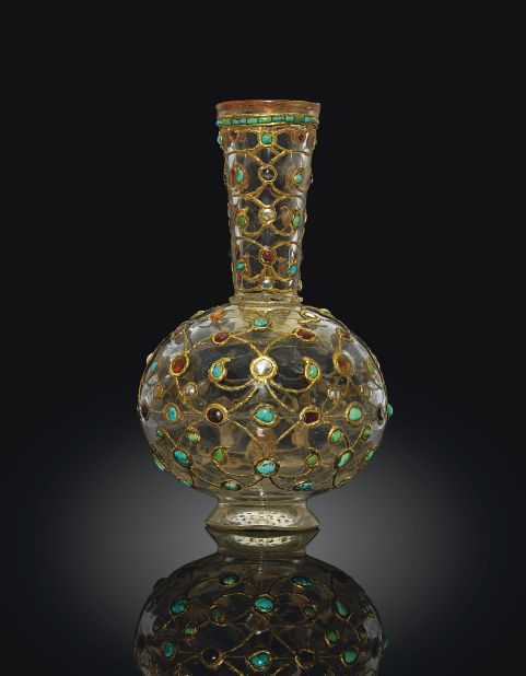 This gem set rock crystal bottle was up for auction at Christie's. Encrusted with gold and precious stones, it dates back to 17th century Mughal India.