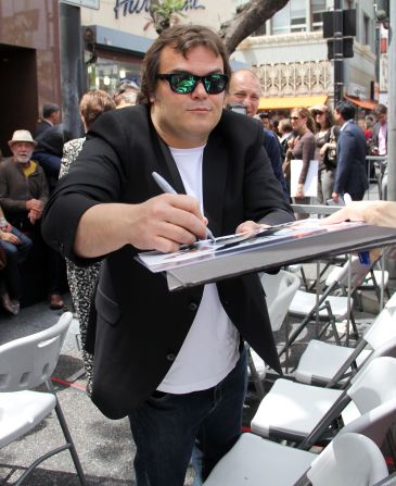 Jack Black signs autographs at an event in Hollywood.