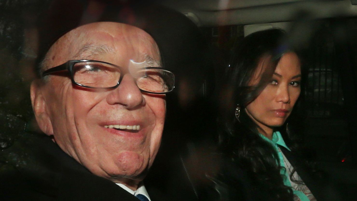Rupert Murdoch leaves The Royal Courts of Justice with his wife Wendi Deng Murdoch after giving evidence to The leveson Inquiry on April 25 in London, England.