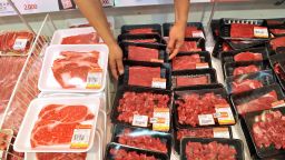 A South Korean employee displays local beef at a Lotte Mart as the store suspended sales of all US beef in Seoul on April 25, 2012. Two major South Korean retailers suspended sales of US beef after a new case of mad cow disease in California, and the government said it would tighten inspection of imports. AFP PHOTO / JUNG YEON-JE (Photo credit should read JUNG YEON-JE/AFP/Getty Images) 