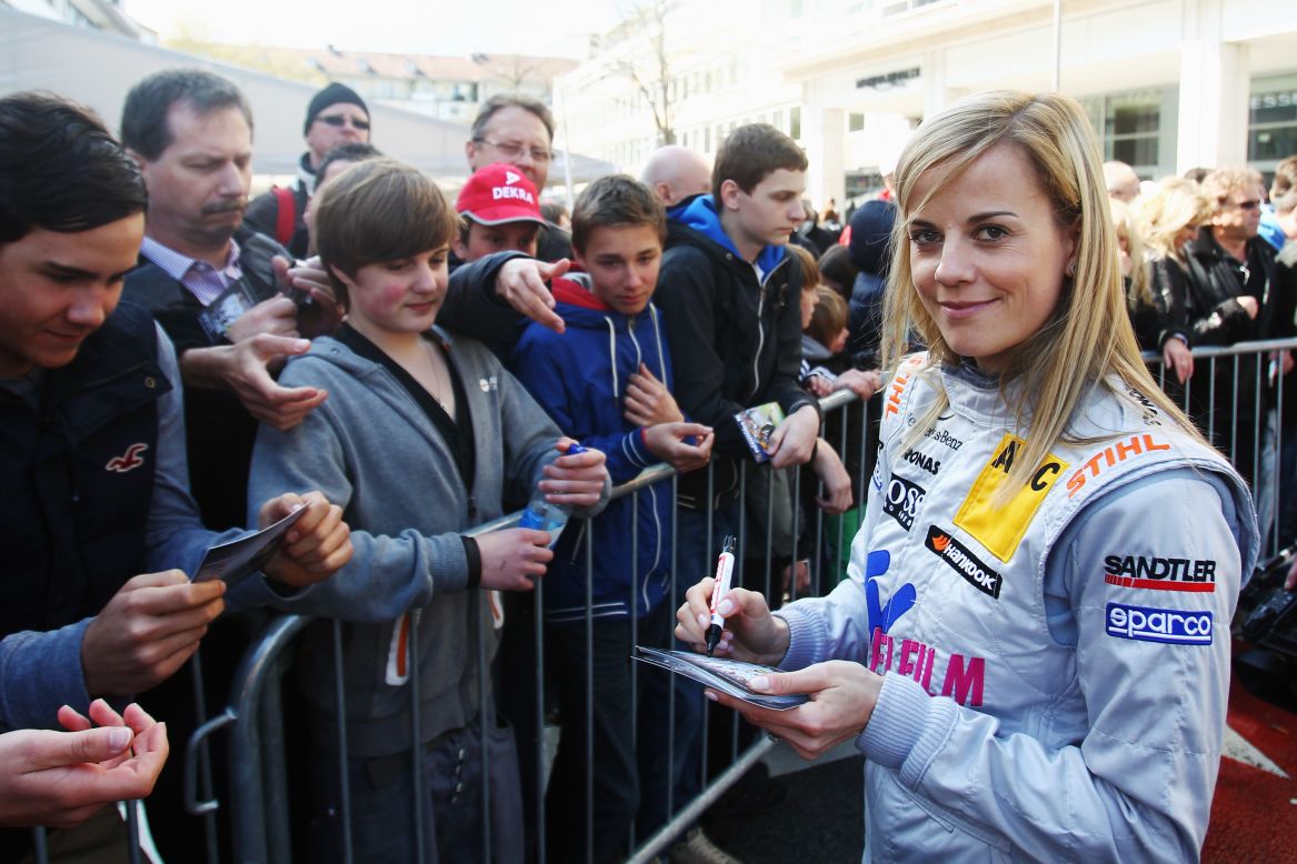 Signing autographs for fans -- in 2010, Wolff finished ahead of David Coulthard and Ralph Schumacher in the DTM championship.