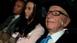 Rupert Murdoch (R) his wife Wendi Deng (C) and son Lachlan (L) leave their London home on April 26.