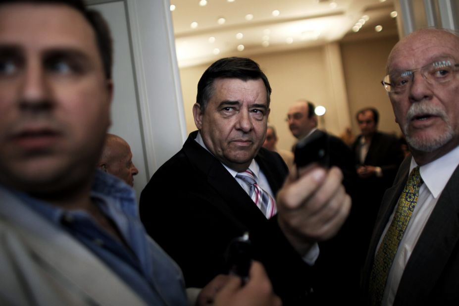 Greek far right LAOS party leader George Karatzaferis arrives for a pre-election speech at the Zappeion Hall in Athens on April 23, 2012. Smaller parties have enjoyed a surge as disenchanted voters turn away from the main parties.  
