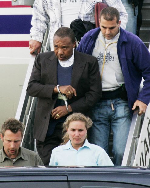 Charles Taylor arrives at Rotterdam Airport in June 2006 for his war crimes trial following his arrest in Nigeria.