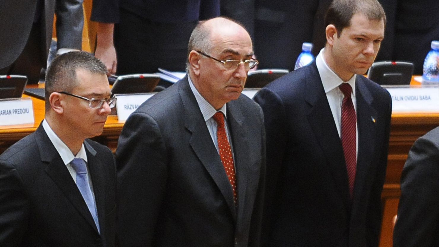 Outgoing Prime Minister Mihai Razvan Ungureanu, left, and members of his government in Parliament on Wednesday.