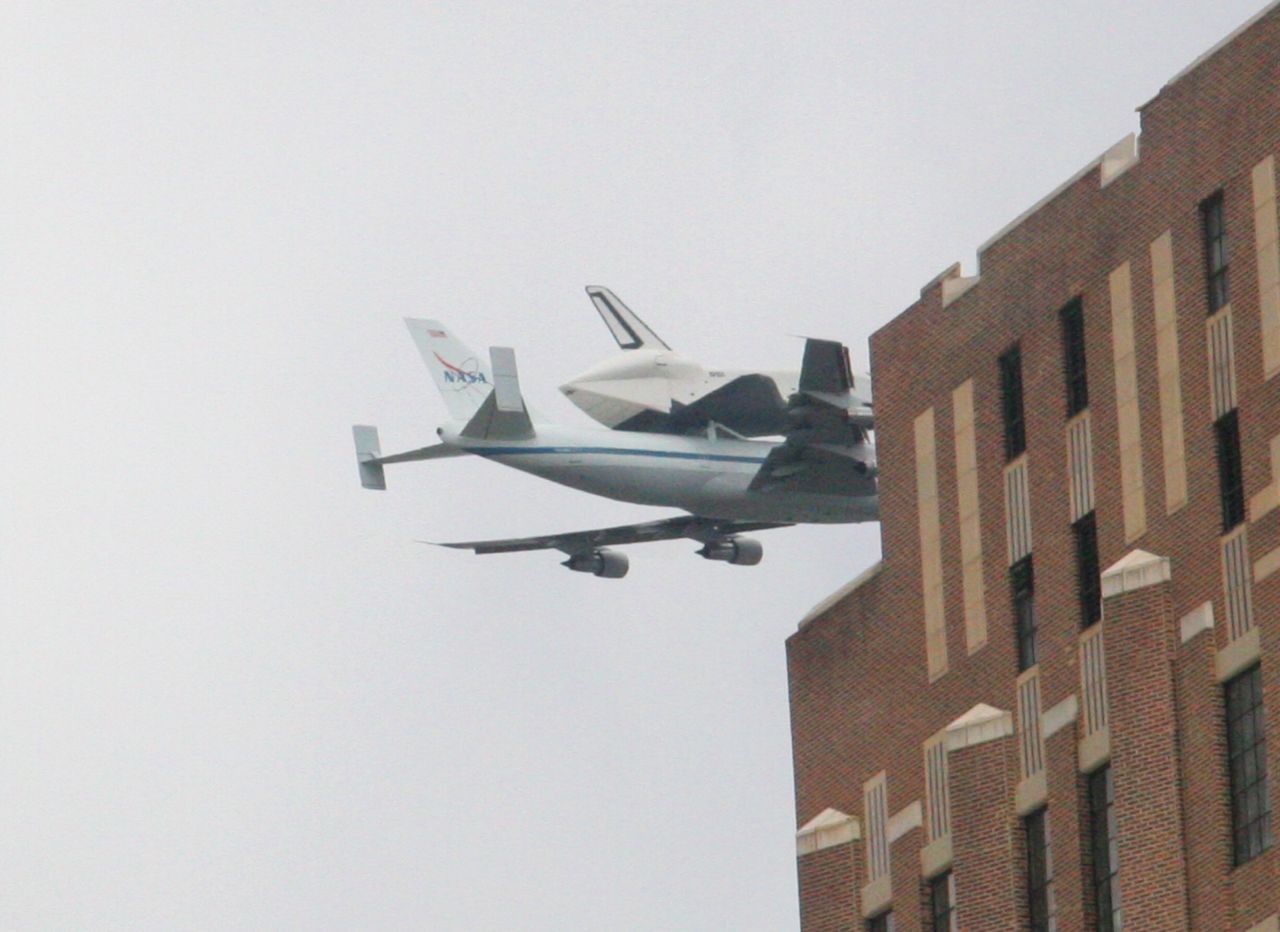 Ebony Simmons shot these photos of the Enterprise's journey from the roof of her office building. The iReporter said she loves the space program, and that it "should absolutely NEVER come to an end."