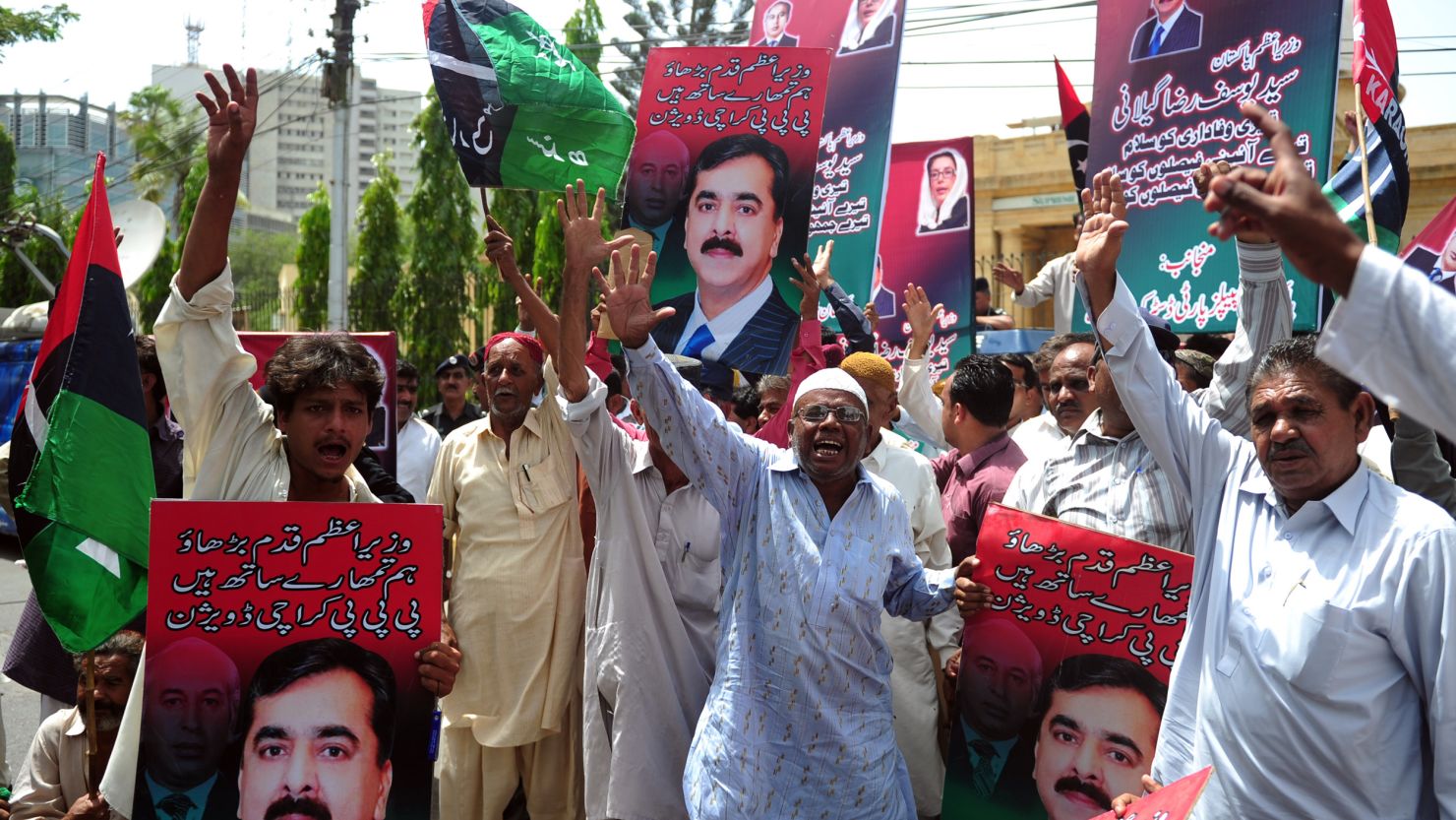 Supporters of the ruling Pakistan Peoples Party (PPP) protest the verdict against Gilani.