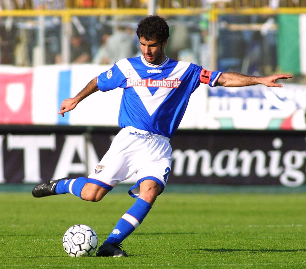 He had two spells at Serie A side Brescia either side of a brief time at Roma, and is pictured playing against Perugia in 2002.