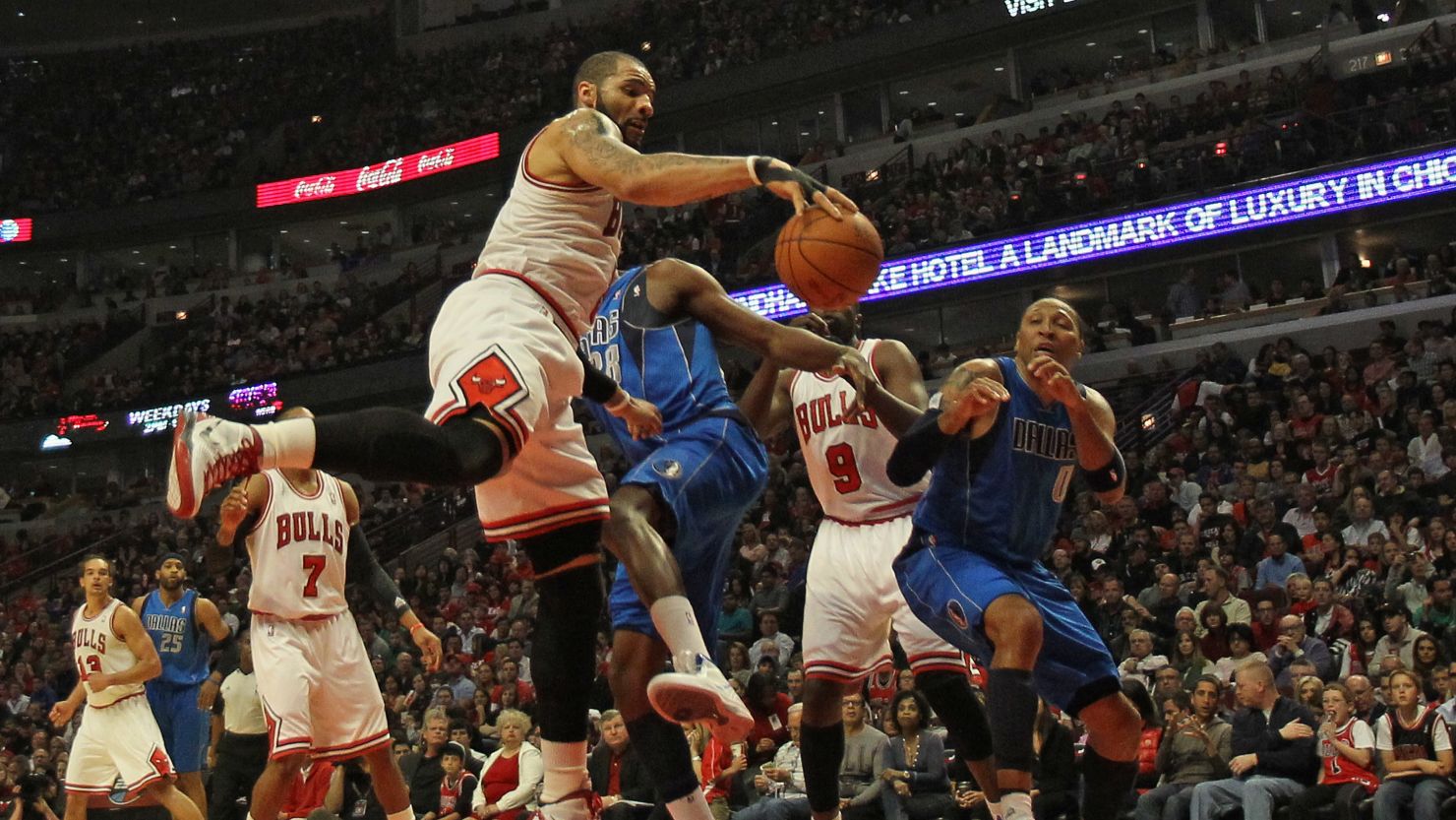 One day we could see players such as those in this recent Chicago Bulls-Dallas Mavericks game wearing ads on their jerseys.