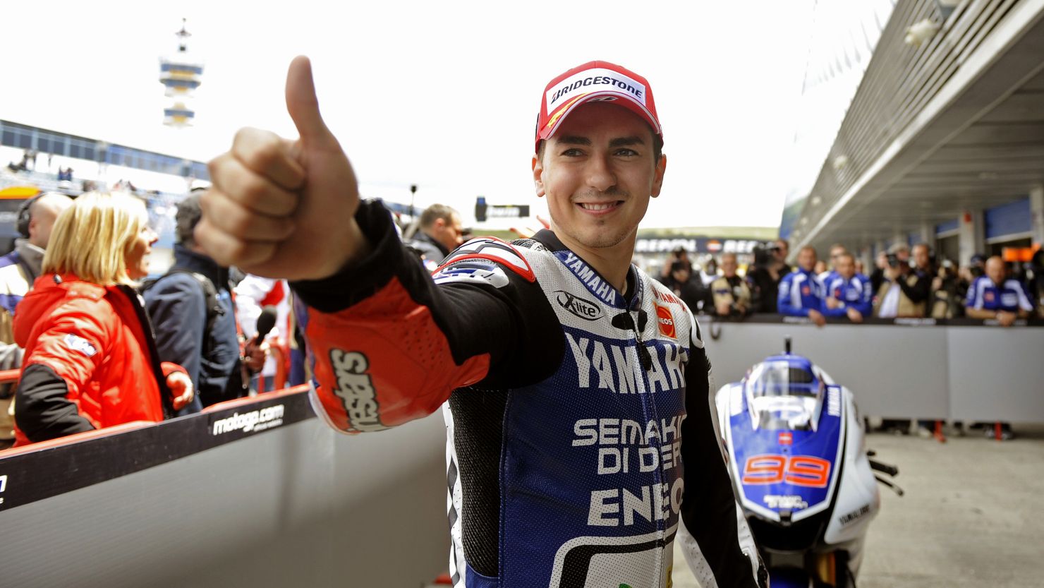 Jorge Lorenzo of Spain gives the thumbs up after a superb lap secured pole position for Sunday's Spanish MotoGP