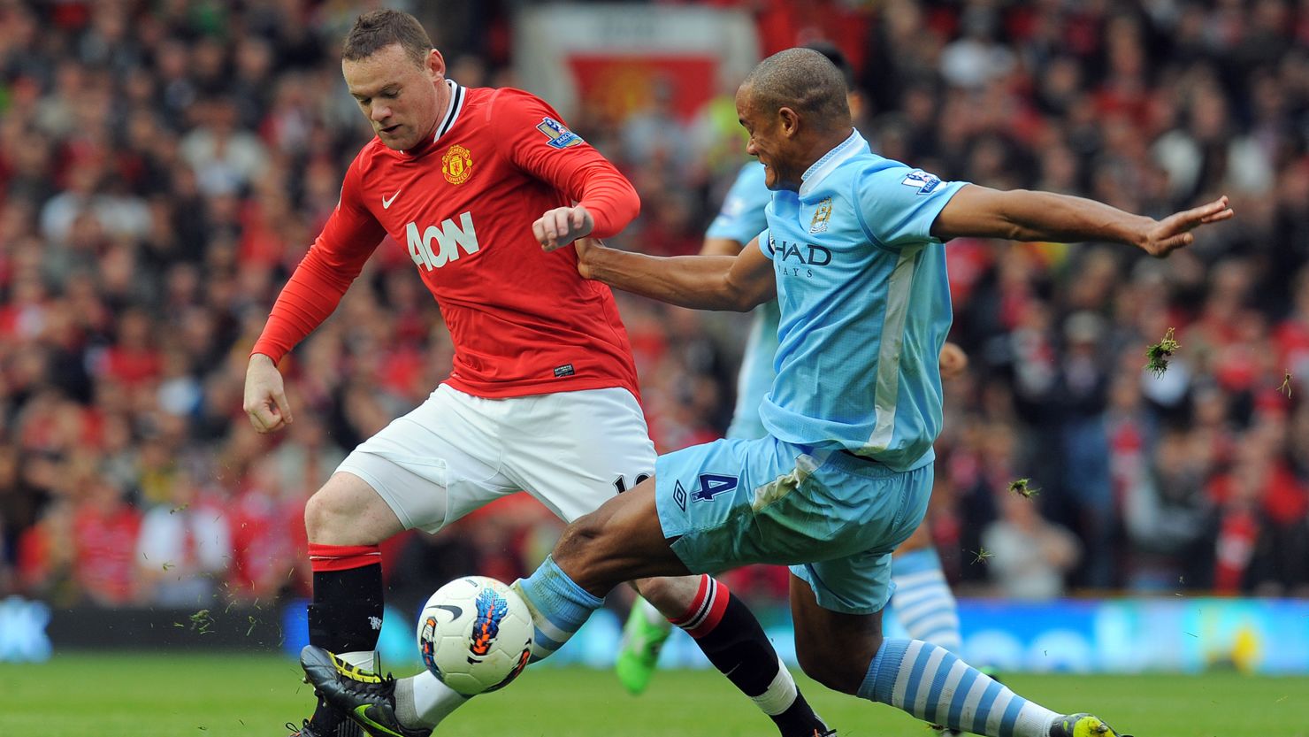 Wayne Rooney, left, and Vincent Kompany did battle in October's Manchester derby, which City won handily 6-1.