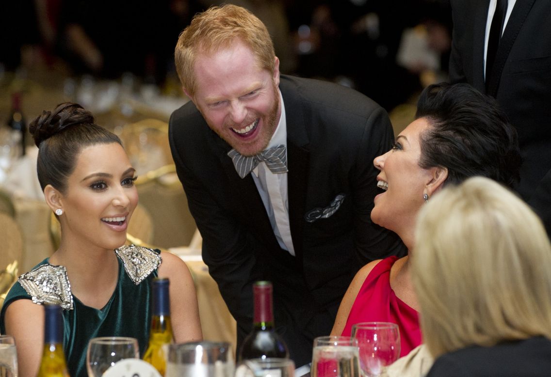Actor Jesse Tyler Ferguson chats with Kim Kardashian and her mother, Kris Jenner.
