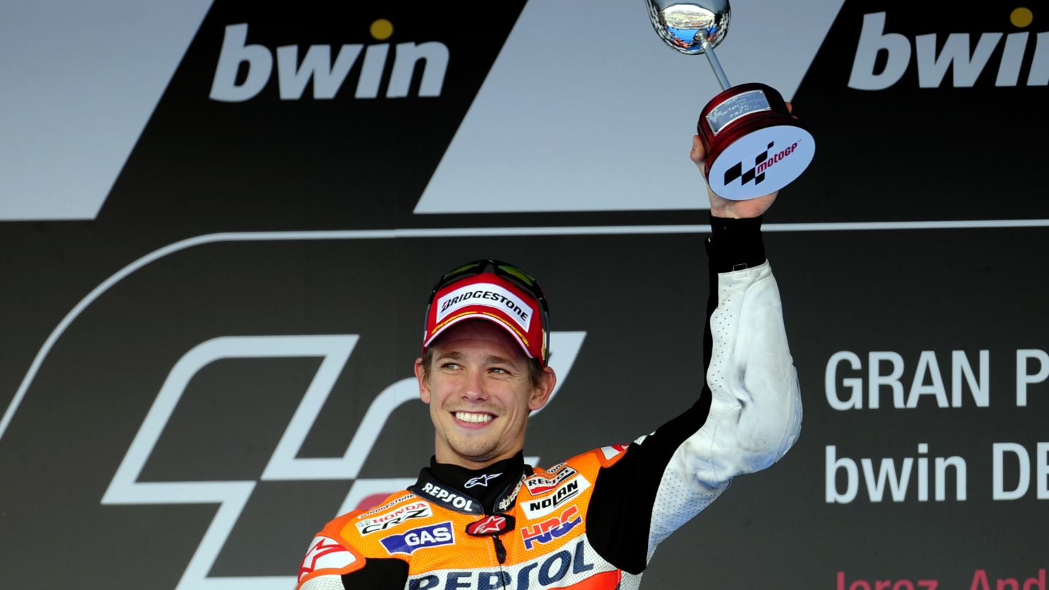 Casey Stoner of Australia celebrates his first win at the Spanish MotoGP on Sunday 