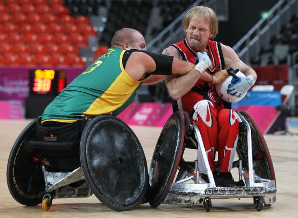 Garret Hickling, right, wrestles with an opponent during Canada's losing clash to eventual winners Australia at the Paralympic test event in London.